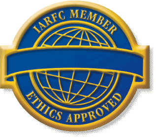 Circular badge displaying a blue globe with gold outline. Text reads "IARFC Member" and "Ethics Approved." A blank blue banner crosses the center.